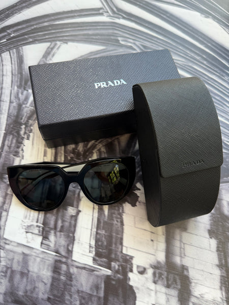 PRADA Brand New ORIGINAL Sunglasses (Current Retail Price (R5601) comes with box and holder